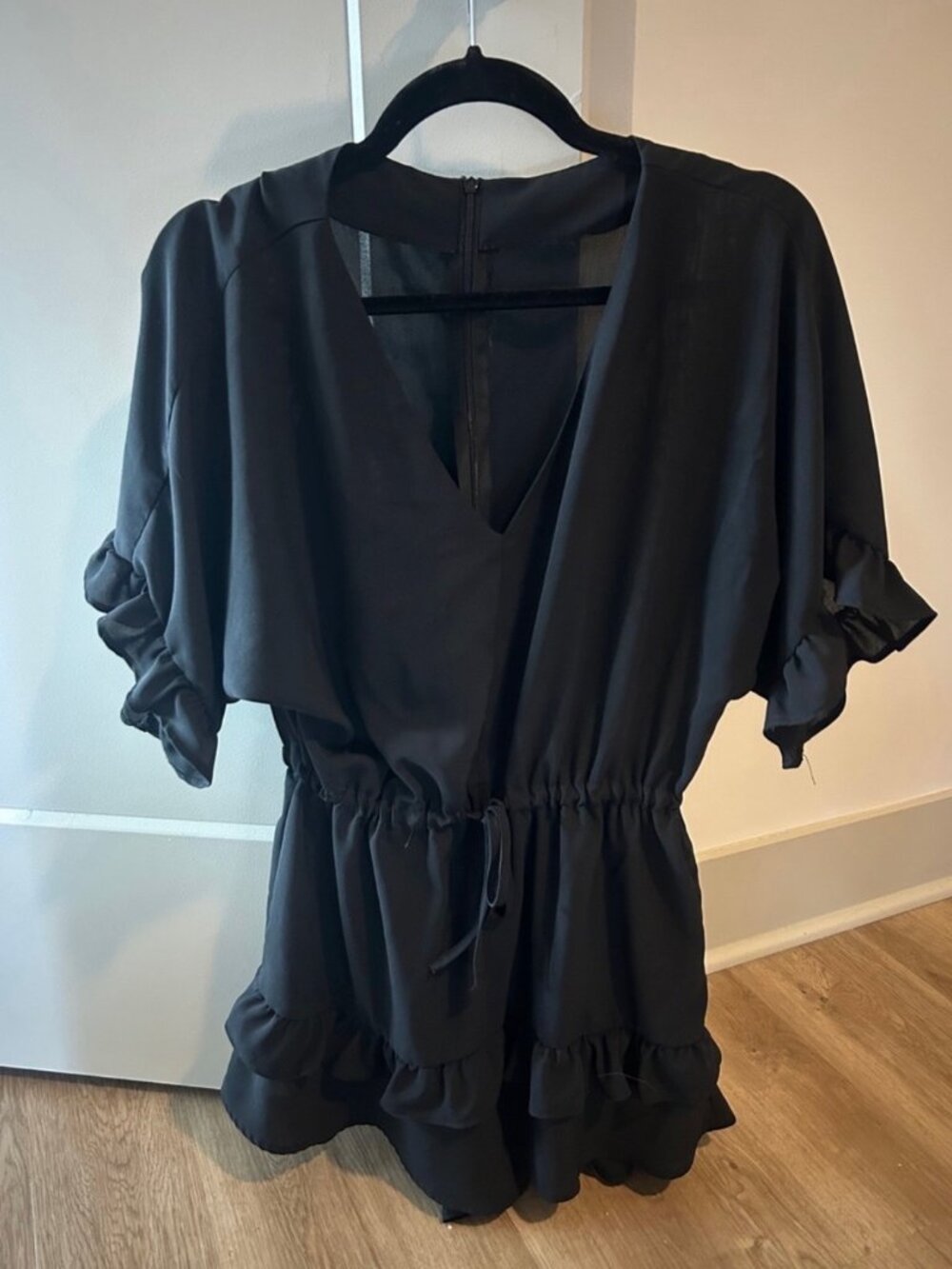 Black Short Romper with Ruffle Hem